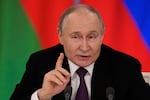 Russian President Vladimir Putin speaks during a joint news conference with Belarusian President Alexander Lukashenko following their talks at the Grand Kremlin Palace in Moscow, Russia, Thursday.