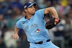 Toronto Blue Jays pitcher Max Scherzer throws against the Seattle Mariners during the first inning in Game 4 of baseball's American League Championship Series, Thursday, Oct. 16, 2025, in Seattle.