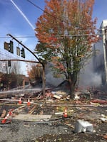 Debris from Wednesday morning's gas explosion in Portland blankets the street.