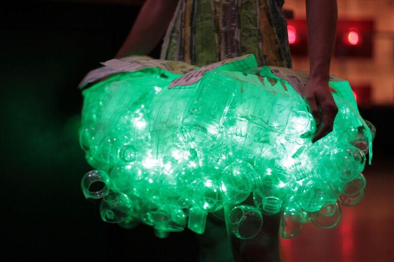 Suzanne Swanson was aglow in this plastic bubble skirt dress made of Vitamin Water bottles. The bottle tops were gathered to build the skirt and a connected corset was covered with multicolored water bottle labels.