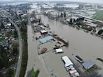 A view looking upstream on the Snohomish River with the city of Snohomish on the left and Harvey Airfield on the right. Snohomish County officials shared the image on Friday afternoon.