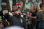 A 2017 file photo of Patriot Prayer leader Joey Gibson addressing a crowd at a rally and holding a moment of silence for the victims of the Portland MAX train stabbings.