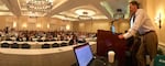 Paul Terdal makes a presentation to the Autism Law Summit in 2018.
