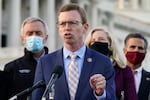 Rep. Dusty Johnson, R-S.D., speaks during a news conference with the Problem Solvers Caucus about the expected passage of the emergency COVID-19 relief bill, Monday, Dec. 21, 2020, on Capitol Hill in Washington. Congressional leaders have hashed out a massive, year-end catchall bill that combines $900 billion in COVID-19 aid with a $1.4 trillion spending bill and reams of other unfinished legislation on taxes, energy, education and health care.