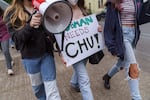 Students at Harriet Tubman Middle School in North Portland march to the Portland Public Schools district offices, May 13, 2022, unhappy over the district’s decision to place teacher Bryan Chu on leave. 