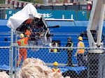 Debris from the Titan submersible, recovered from the ocean floor, is unloaded from the ship Horizon Arctic at the Canadian Coast Guard pier in St. John's, Newfoundland, on June 28, 2023.