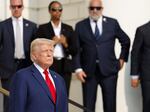 Republican presidential nominee, former President Donald Trump looks on during a wreath laying ceremony at the Tomb of the Unknown Soldier at Arlington National Cemetery on August 26, 2024 in Arlington, Virginia.