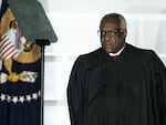 Supreme Court Justice Clarence Thomas listens during a ceremony on the South Lawn of the White House in 2020.