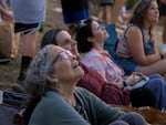 Hester Van Heemstra watches Vaux's swifts begin to gather at Chapman Elementary in Portland, Oregon.