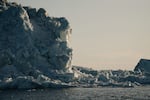 The sunset reflects off of an iceberg in Ilulissat, Greenland on Feb. 18, 2025.