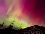 The Northern Lights fill the sky at the Bogus Basin ski resort in Boise, Idaho, on Saturday.