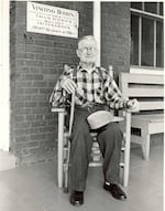 In this photo circa 1940s, a resident of the Multnomah County Poor Farm in Troutdale sits on the porch.