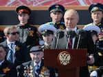 Russian President Vladimir Putin gives a speech during the Victory Day military parade at Red Square in central Moscow on May 9, 2023