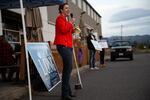 Carolyn Long delivers a drive-through town hall in Washougal, Wash., on Oct. 12. Long has raised almost as much money in her 2020 campaign as she did in 2018.