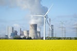 Wind turbines stand next at the Neurath coal-fired power plant on April 15, 2024, in Ingendorf, Germany.