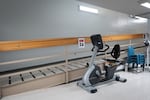 A wheelchair-accessible ramp and a stationary bike at the Minnesota Correctional Facility in Oak Park Heights, Minn., are physical accommodations made available for the aging population at the prison.