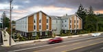 In this photo provided by Central City Concern, the nonprofit's newest housing complex, Cedar Commons, is pictured..