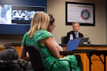 City Manager Eric King (right) listens as Human Rights and Equity Commission members give public comment during a City Council meeting on Aug. 6, 2025 in Bend, Ore. Chair Agatha Ventura requested a meeting with City Council and the Human Rights and Equity Commission to discuss the delay in payment to an organizer for a Juneteenth event.