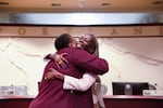 Commissioner Jo Ann Hardesty embraces judge Adrienne Nelson after taking the oath of office. 