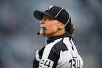 FILE - Line judge Robin DeLorenzo looks on during the second half of an NFL football game between the Jacksonville Jaguars and the Tennessee Titans, Dec. 29, 2024, in Jacksonville, Fla.