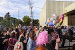 A crowd gathers to witness the ribbon cutting at the Marie Equi Center in Portland, Ore., on Oct. 11, 2024.