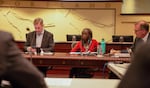 Portland Mayor Ted Wheeler and Commissioner Jo Ann Hardesty listen during a work session discussing Portland's involvement in the Joint Terrorism Task Force at City Hall Tuesday, Feb. 12, 2019, in Portland, Ore. Hardesty has proposed withdrawing Portland from the JTTF, while Wheeler opposes it.