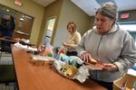 Moore County resident Lucille Christie, right, came to an emergency shelter after spending two nights home alone without electricity.