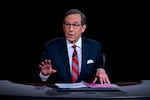 FILE - Moderator Chris Wallace of Fox News speaks as President Donald Trump and Democratic presidential candidate former Vice President Joe Biden participate in the first presidential debate in Cleveland on Sept. 29, 2020.