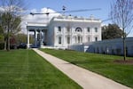 Construction cranes being used for the White House ballroom are seen around the White House, Monday, March 23, 2026, in Washington.