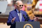 President Joe Biden speaks at a podium in Chandler, Ariz., at the Intel Ocotillo Campus. Donald Trump will not appear in Oregon voters’ pamphlet after Trump declined to submit a statement.