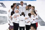The 2026 U.S. Olympic figure skating team celebrates on the ice after being announced in St. Louis on Jan. 11.