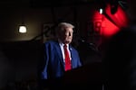 Republican presidential nominee former US President Donald Trump speaks to supporters during a campaign event at Saginaw Valley State University on October 03, 2024 in Saginaw, Michigan.