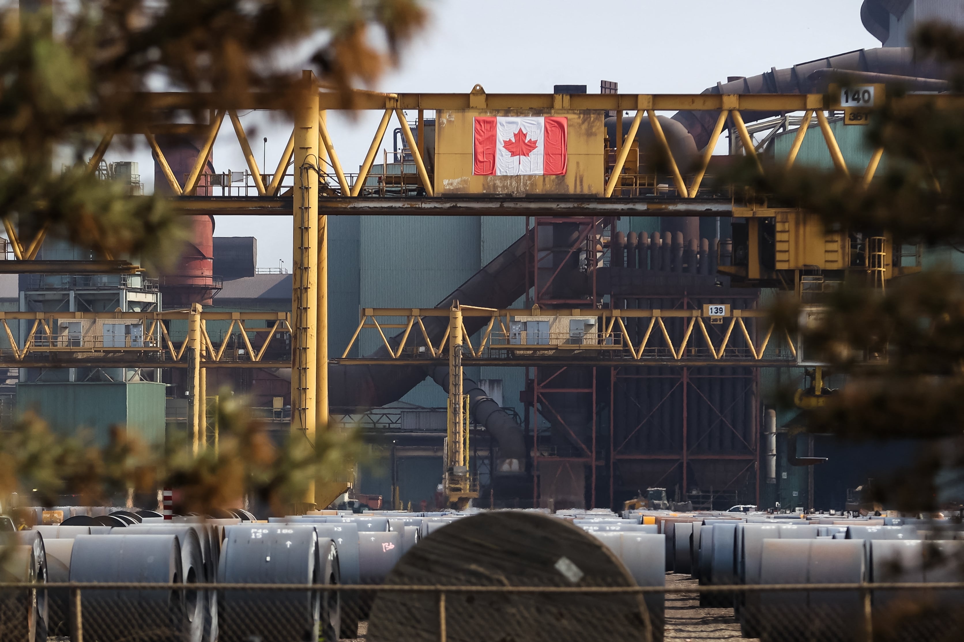 Rolls of steel sit in a yard at Canadian steel company Stelco's Hamilton Works steel plant in Hamilton, Ontario, on June 4.