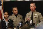 Douglas County Sheriff John Hanlin, right, addresses the media at a news conference at the Roseburg Public Safety Building in Roseburg, Oregon, on Oct. 2, 2015.