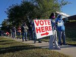 Voters line up to cast their ballots in the 2020 presidential election in Durham, N.C. The U.S. Supreme Court has agreed to hear a North Carolina redistricting case this fall about how much power state legislatures have over how federal elections are run.