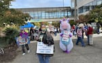 During the afternoon of Oct. 17, 2026, activists and community organizers filed through the Eugene City Hall plaza during the "No Kings" event. One organizer said between 2,000-3,000 people attended.