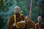 From left, Ajahn Sudanto, Ajahn Kassapo and Tan Sampanno begin their morning alms round through White Salmon.