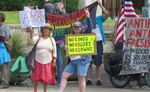 On July 4, 2026, about 60 people gathered at the Eugene Federal Building to protest President Trump's policies. These included protesters and members of a local Quaker organization.