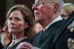 Supreme Court Justice Amy Coney Barrett and retired Supreme Court Justice Anthony Kennedy listen as President Trump addresses a joint session of Congress at the U.S. Capitol on March 4.
