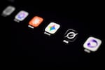 Google Gemini app is seen next to other AI apps, including Claude and Grok.