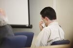 Nicholas McGuffin sheds tears at his trial in 2011. 