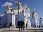 President Biden and Ukrainian President Volodymyr Zelenskyy walk in front of St. Michaels cathedral in Kyiv ahead of the anniversary of Russia's invasion of Ukraine.