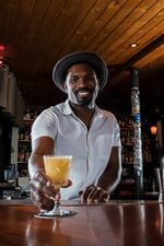 Rum Club bartender Micah Anderson is one of many advocating the Oregon Legislature allow bars to serve cocktails to-go.