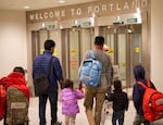 A family of refugees from Afghanistan arrives at Portland International Airport in November 2021 in this photo provided by Lutheran Community Services Northwest. More than than 1,400 refugees from Afghanistan have entered Oregon since the nation fell to the Taliban in 2021.