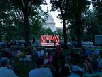 People gather in a park outside of the U.S. Capitol to watch the Jan. 6 House committee investigation hearing on Thursday night. The panel convened again the morning of Monday, June 13, 2022.