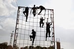 Palestinians take part in training organized by Hamas in the southern Gaza Strip town of Rafah on Jan. 11, 2014.