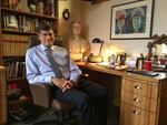 In this February 2016 photo, Vic Gilliam sits at his desk in the Oregon state capitol in Salem.