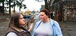 Staffer Gissel Gonzalez and Andrea Bunch at the family shelter, on Portland's Stark Street. 