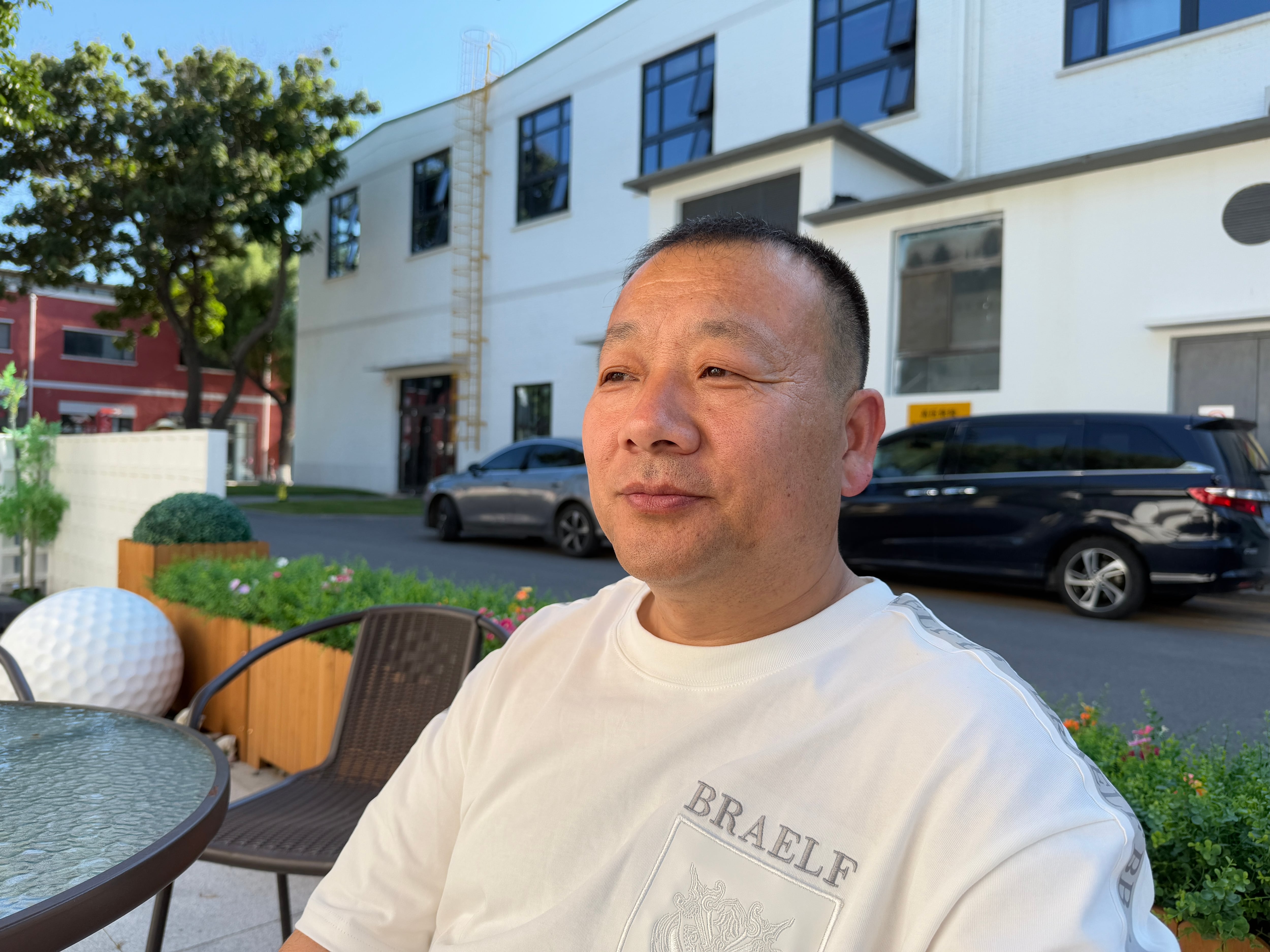 Yang Guangdong, 47, has been in the ride-hailing business for a decade. He says riders' complaints about the smell in cars are often unfair and subjective.