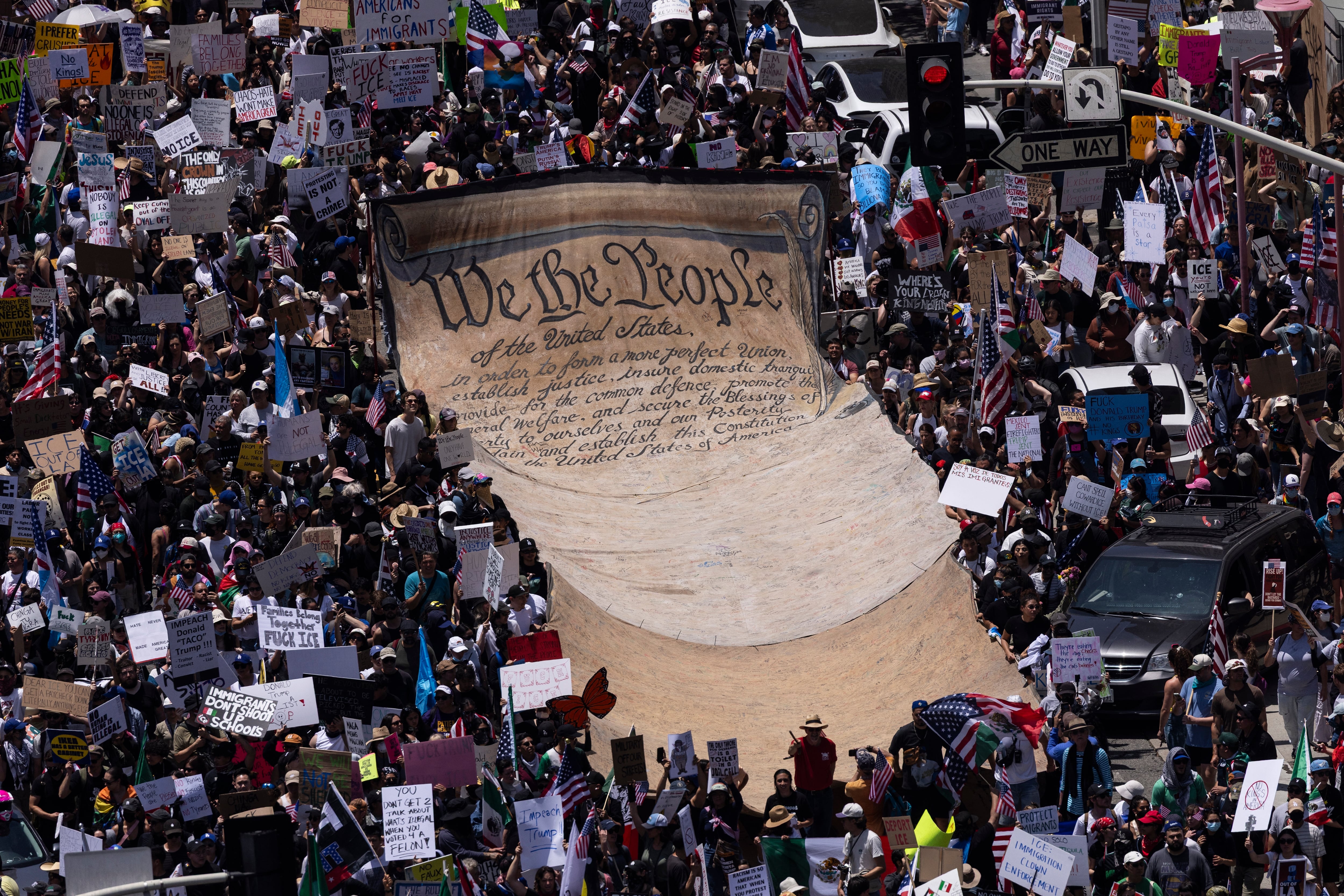 Los Angeles: Demonstrators deploy a giant banner reading